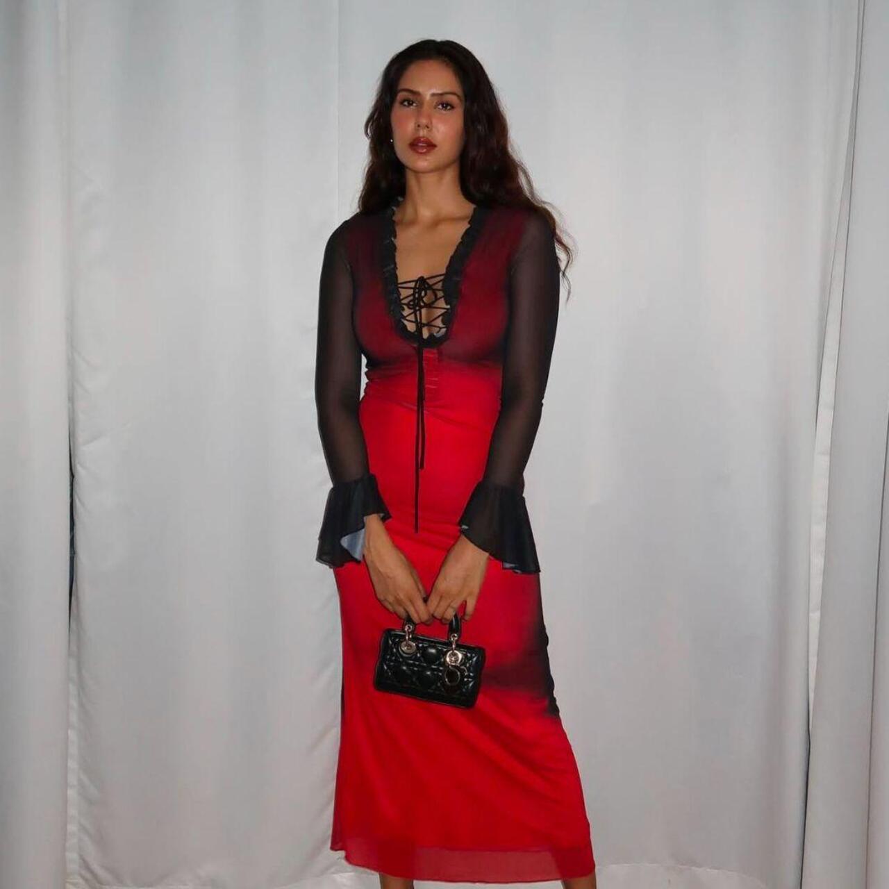 Sonam Bajwa looked effortlessly chic in a breezy red dress with black sleeves and a knotted detail at the neckline, a perfect romantic look for Valentine’s Day.